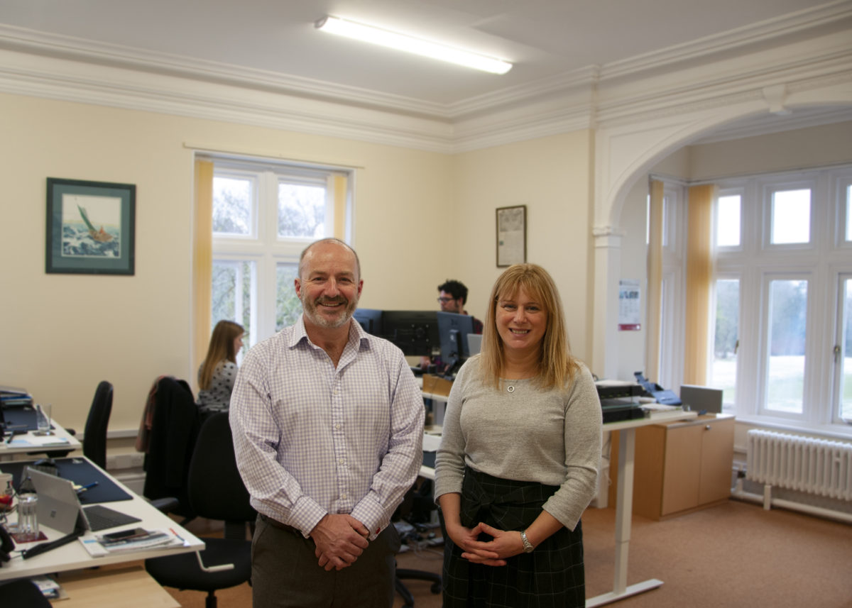 HPi Verification Service’s CEO, Alasdair Reay, and Business Manager, Jacquie Morgan, in their new office space at Howbery Business Park