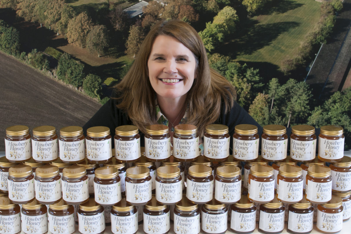 Donna Bowles Estates Manager with Howbery Honey jars