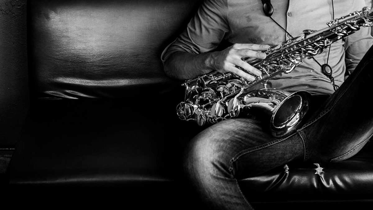Saxophone Player on Sofa